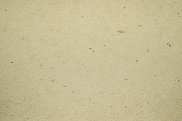 A dense industrial sheet of grey paper with a textured surface