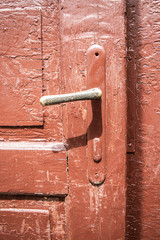 old red door with lock