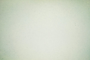 A dense industrial sheet of grey paper with a textured surface