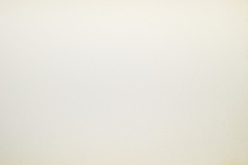 A dense industrial sheet of grey paper with a textured surface