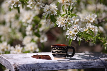 a cup of coffee. morning coffee with chocolate on the terrace