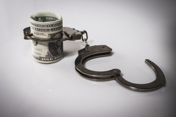 Dollar Bills With Handcuffs.
