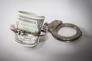 Dollar Bills With Handcuffs.