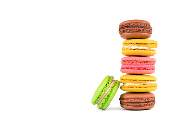 .colored macaroons on a white background