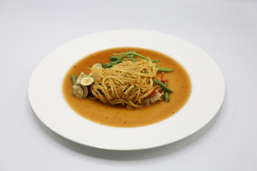 Green Papaya Salad (Som tum Thai) on white background
