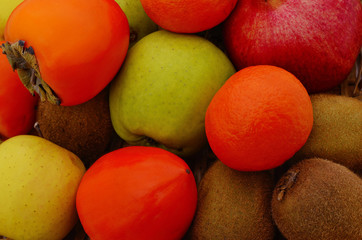 Tangerines, pomegranate and kiwi.