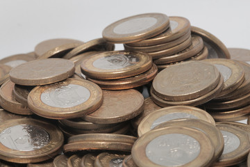 Stacks of Coins and gold coins falling