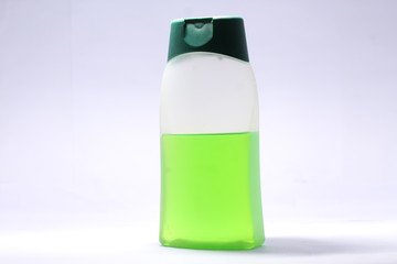 a light green hand sanitizer bottle with alcohol 
