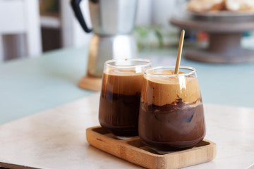 Two glasses with iced coffee drink