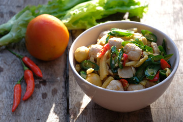 baby corn stir fry with meatballs, also known as tumis jagung muda