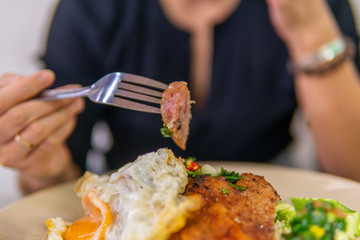Vietnamese broken rice with grilled pork chop, fried egg and meatloaf