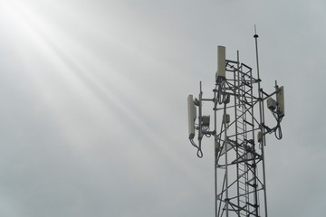 Top of radio and communication towers. with beam from the sky 