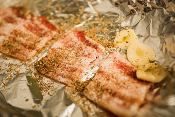 Preparation of billet, balyk with salt and pepper. Foil roasting

