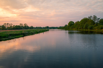 Naklejka na ściany i meble The river Vecht in the province of Overijssel in the Netherlands at sunset