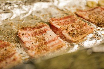 Preparation of billet, balyk with salt and pepper. Foil roasting
