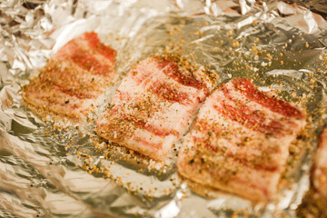 Preparation of billet, balyk with salt and pepper. Foil roasting
