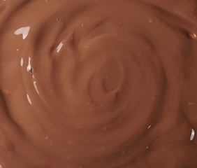 Chocolate cream spread surface background and texture