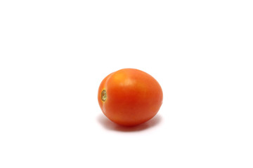 A tomato (Solanum lycopersicum) isolated on white background