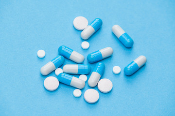 medicine tablets vitamins on the table in the group