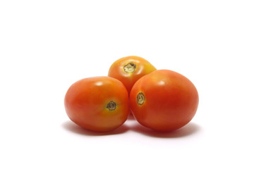 Three tomatoes (Solanum lycopersicum) isolated on white background