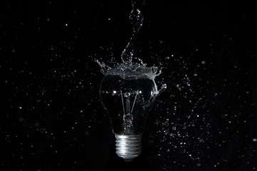 Isolated Led Light Water Splash on black background.