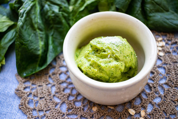 Green mint and spinach leaves creamy homemade ice cream. Vegan sweet dessert