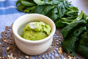 Green mint and spinach leaves creamy homemade ice cream. Vegan sweet dessert