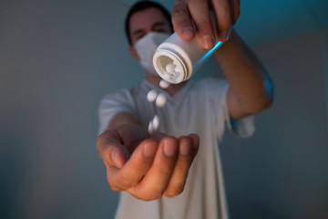 man in a mask with medicine