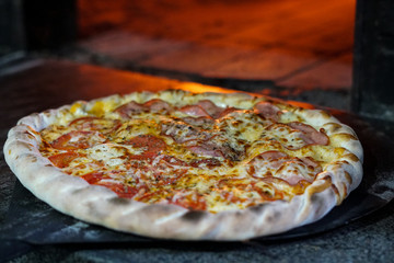 pizza baked in a wood oven