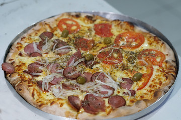 pizza baked in a wood oven