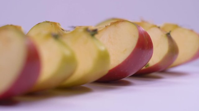 Apple Slices in a Row Spinning. Fresh, Ripe.
