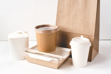 Various packaging for food delivery on white background.