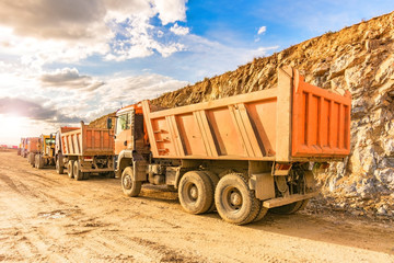 Dump truck fleet in a stone and rock transport mine © Enrique del Barrio