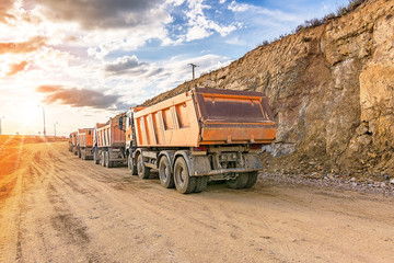 Dump truck fleet in a stone and rock transport mine © Enrique del Barrio