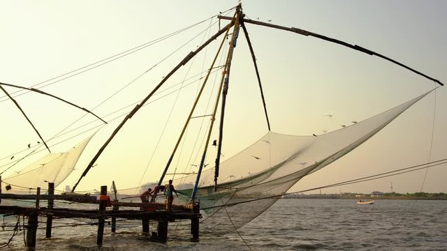 Chinese fishing net at sunrise in Cochin, Kerala, India