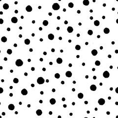 Hand-drawn black and white seamless texture with circles and dots. Vector repeat pattern.