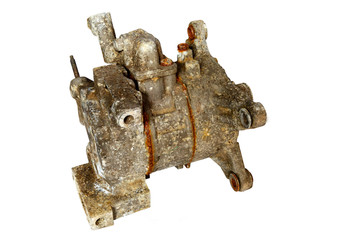 Old car starter gear, part of engine starter motor isolated on a white background
