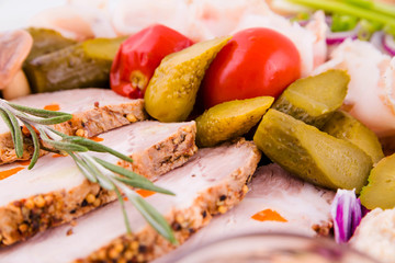 Russian traditional snack on a wooden board on a white background