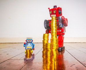 concept inequality with a toy robot and  gold 