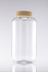a glass bottle containing a drug with a lid.
