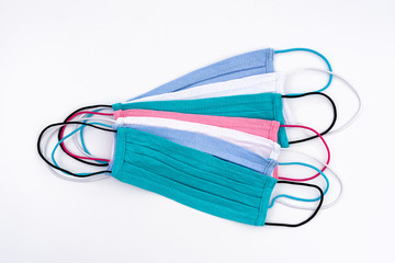 Colorful cotton masks. Reusable fabric masks for coronavirus protection. Handmade multicolored...
