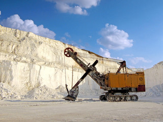 Fototapeta premium Working excavator in the chalk quarry