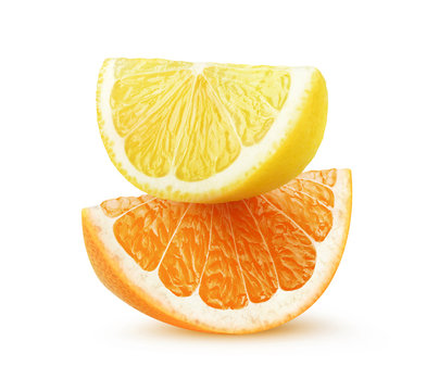 Isolated citrus slices. Pieces of lemon and orange fruit on top of each other isolated on white background