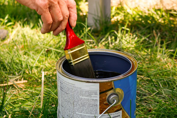 paint can with brush