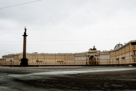 SAINT PETERSBURG, RUSSIA - APRIL 26, 2020: Panorama of the Palace Square in St. Petersburg. Photo of the palace cloak in cloudy weather. Alexander's Column on Palace Square in St. Petersburg.