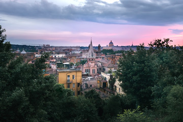 View across Rooftops of Rome and St Peter's at Sunset, Rome, Italy