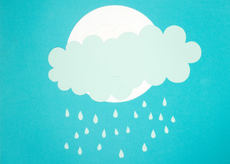 Paper-cut of a cloud raining