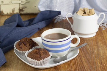 Chocolate cup, muffins and sugar