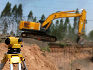 Grading and surveying work for road construction