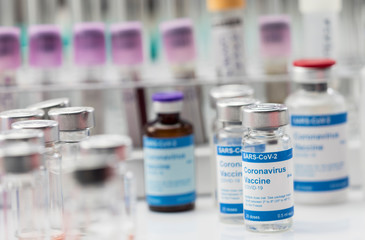 Coronavirus covid-19 experimental vaccine in a laboratory, conceptual image